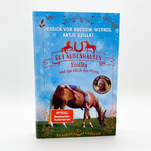 Buchcover und Innenansicht für das Buch: Gut Aubenhausen - Emilia und das Glück der Pferde