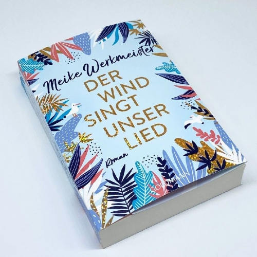 Buchcover und Innenansicht für das Buch: Der Wind singt unser Lied