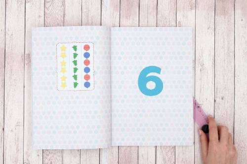 Buchcover und Innenansicht für das Buch: Mein Adventskalender zum Rätseln, Spielen und Basteln