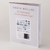 Buchcover und Innenansicht für das Buch: Im Heimweh ist ein blauer Saal