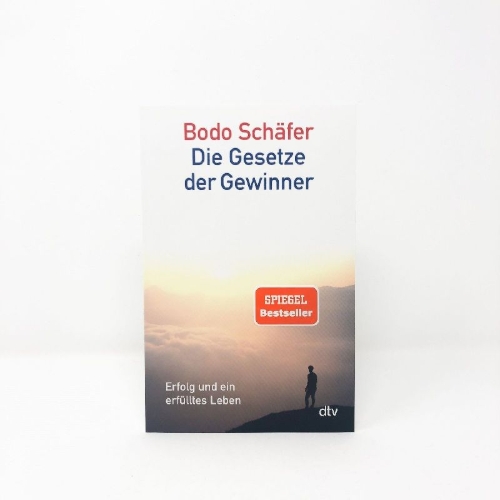 Buchcover und Innenansicht für das Buch: Die Gesetze der Gewinner