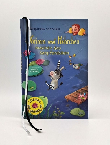 Buchcover und Innenansicht für das Buch: Grimm und Möhrchen machen das Seepferdchen