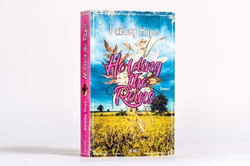 Buchcover und Innenansicht für das Buch: Holding The Reins (Silver Pines Ranch 1)